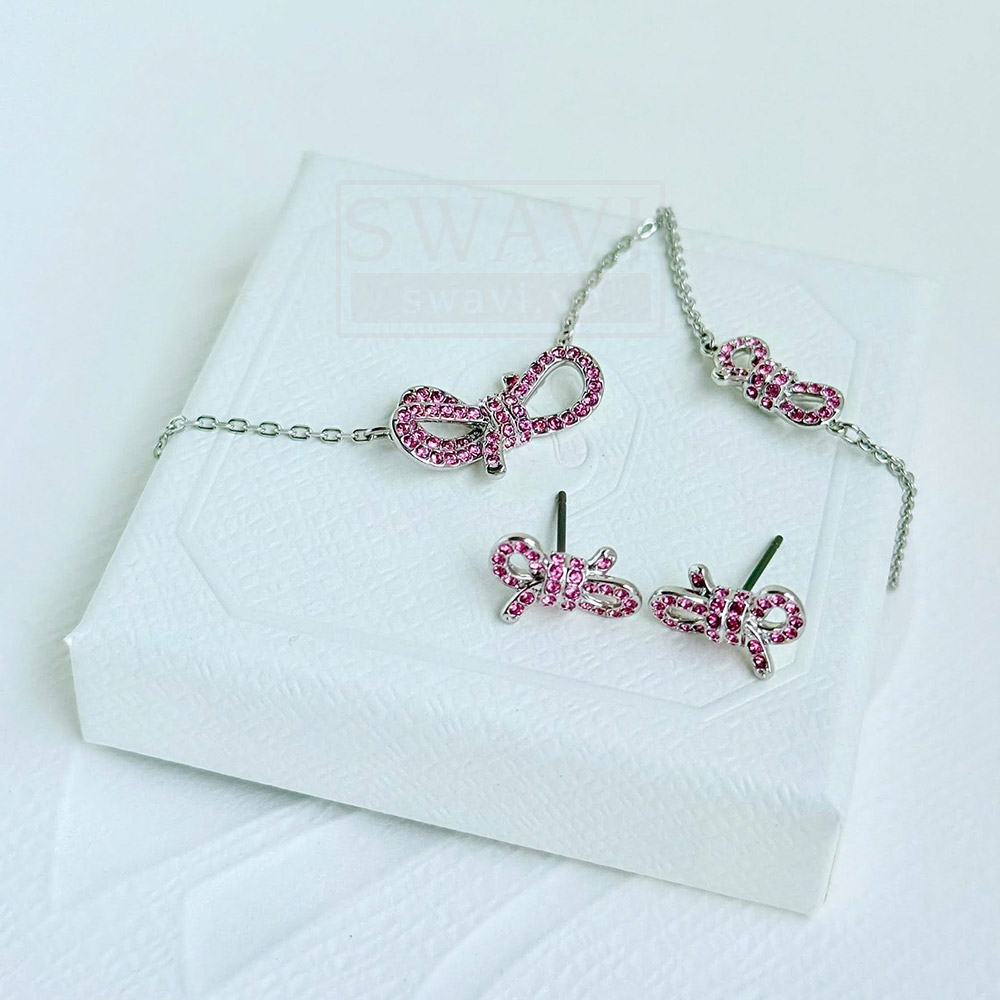 Lắc tay Swarovski Lifelong Bow 5723553 màu hồng cùng bông tai và dây chuyền